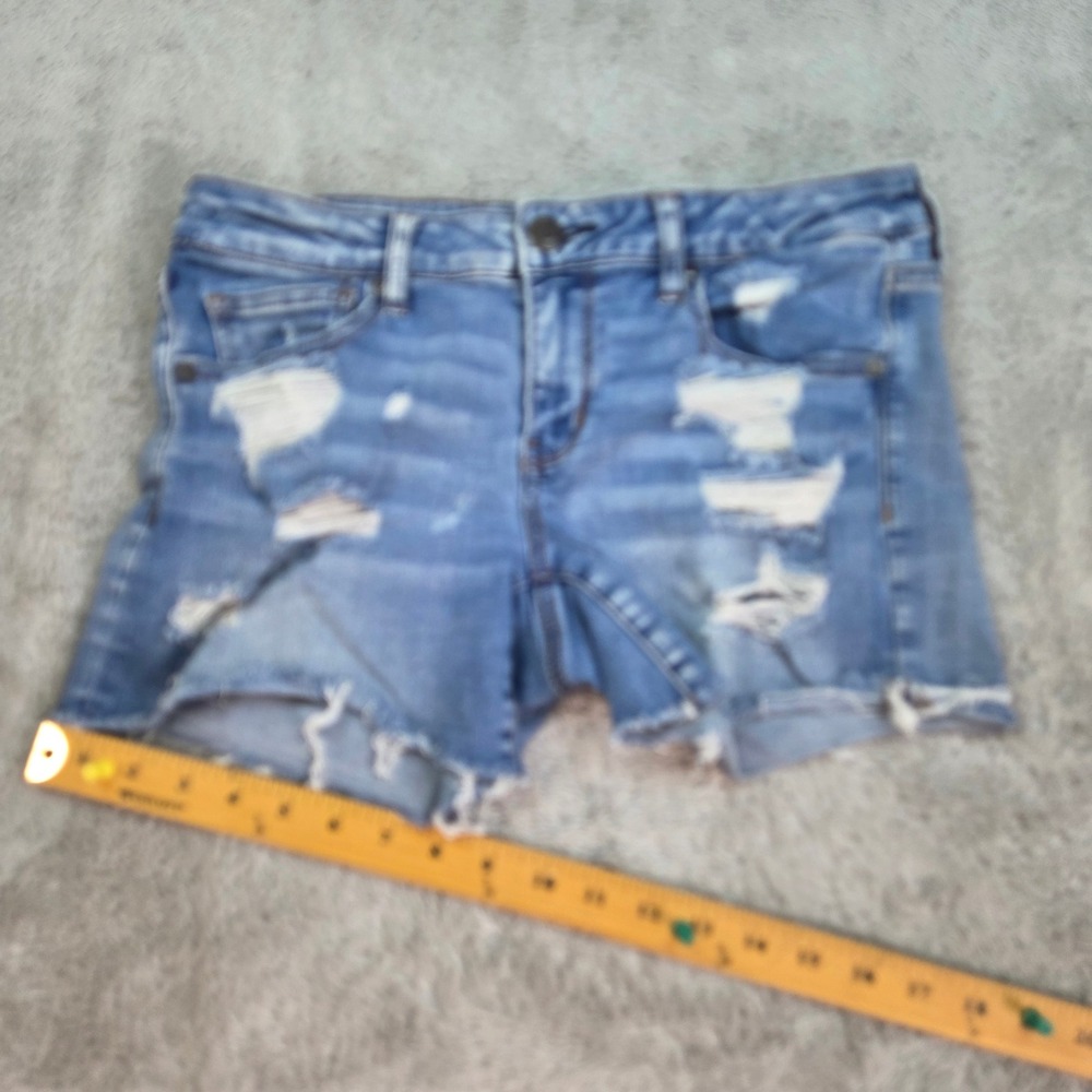 American Eagle Superlow Shortie Womens Sz 12 Distressed Super Stretch Denim Blue